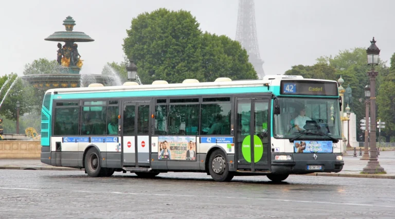 Buses in Paris on a foggy day
