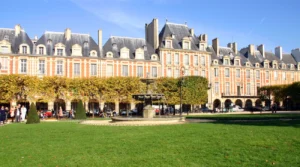 View of the fountain in Place des Volgi in the Marais district