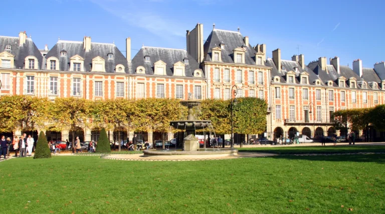 View of the fountain in Place des Volgi in the Marais district