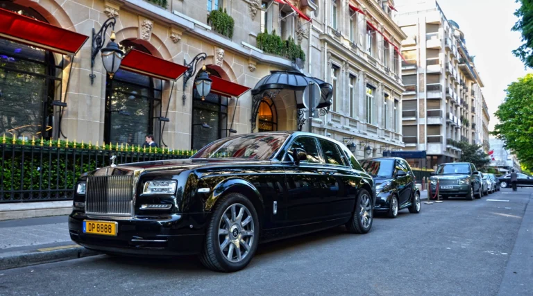 Bentley parked outside a hotel in Paris