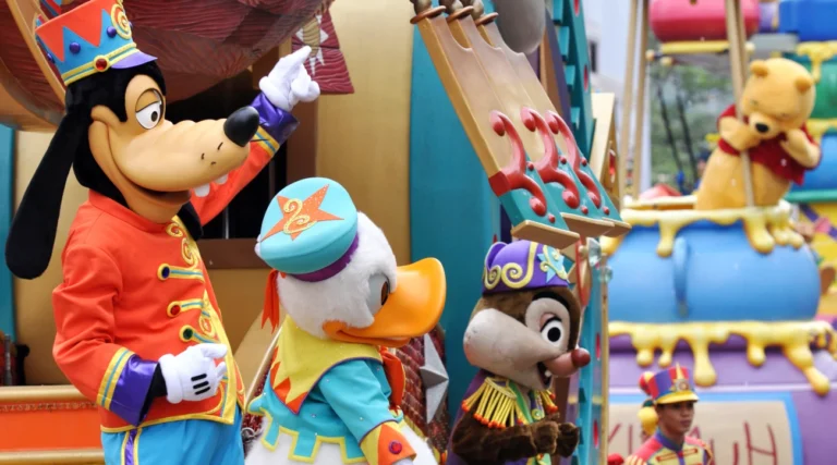 Mascots and characters during a parade at Disneyland