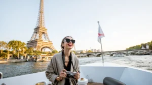 Tourist enchanted by Paris while sailing on the Seine